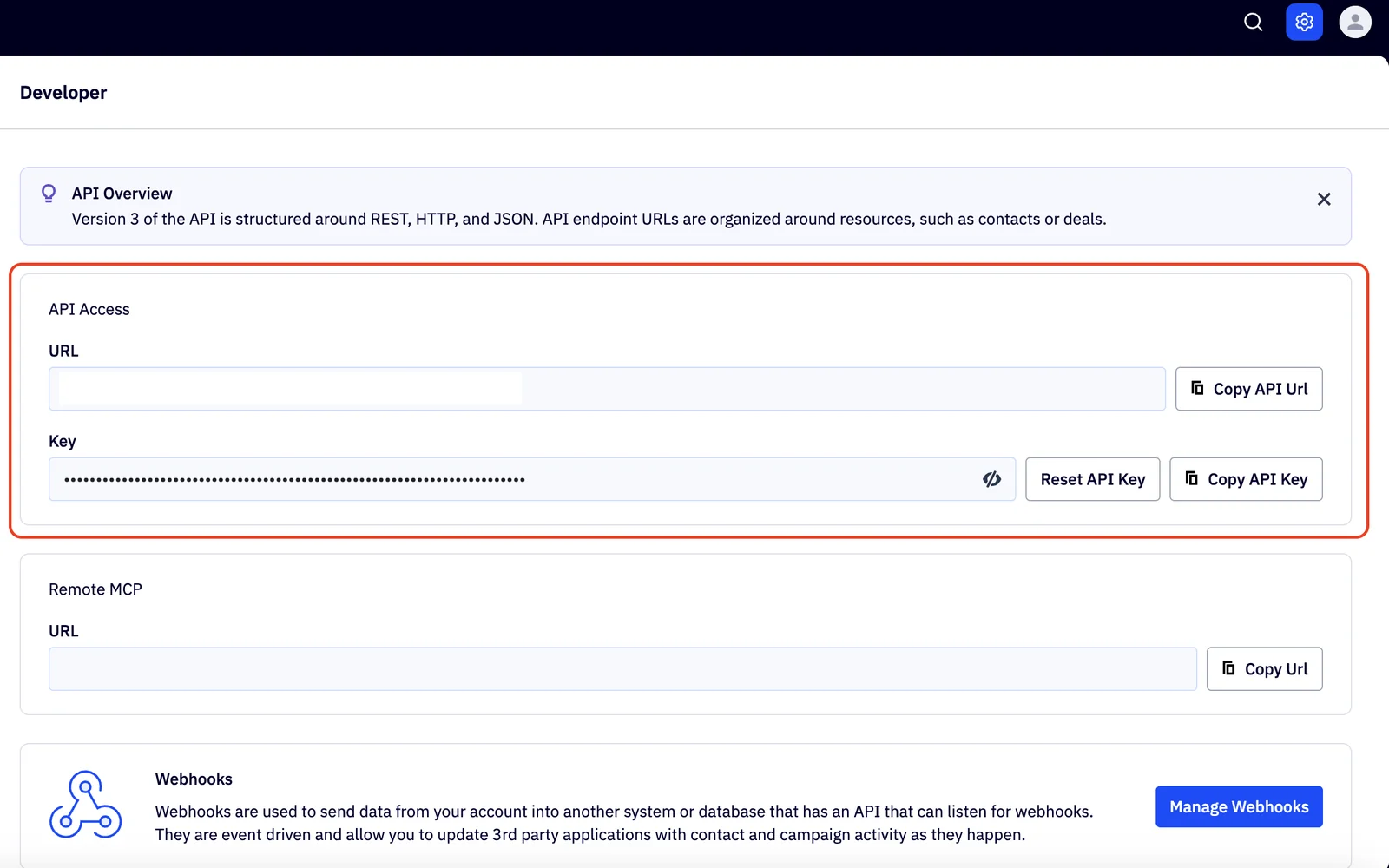 ActiveCampaign Settings, Developer page: the API Access section with the URL and Key fields and their copy buttons, and the Manage Webhooks button below