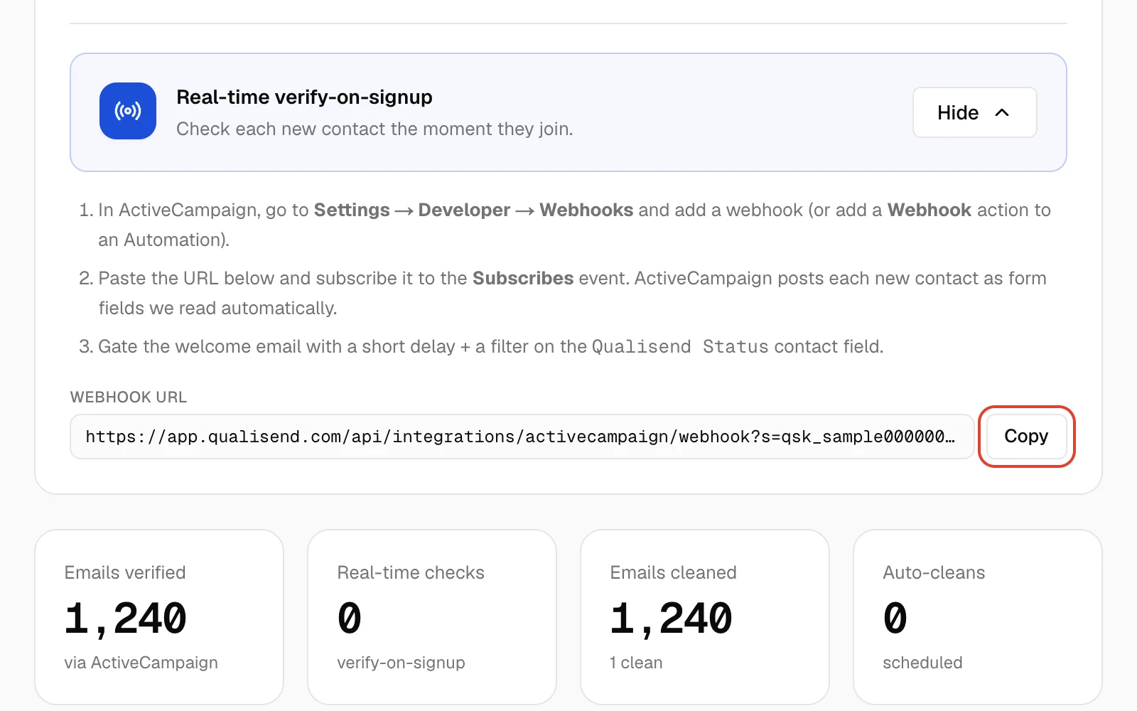 Real-time verify-on-signup card in Qualisend with the setup steps and the webhook URL
